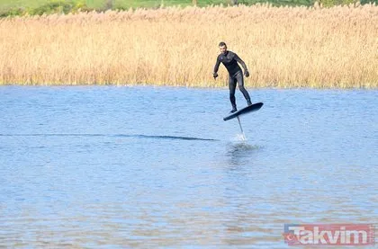 Dünya şampiyonu Kenan Sofuoğlu, karadaki hız tutkusunu flyboardla göle taşıdı