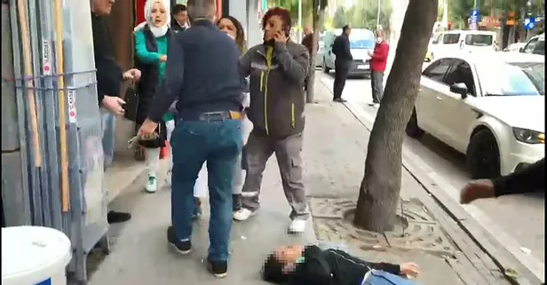 Eskişehir'de sokak ortasında kadına şiddet! Tekme ve yumruklarla yere serdi