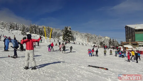Uludağ'da yoğunluk! Kayak pistleri tıklım tıklım - 16