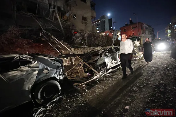 İran'dan İsrail'e misilleme! Füzeler yağdı binalar yıkıldı | İşte yıkımdan kareler - 46