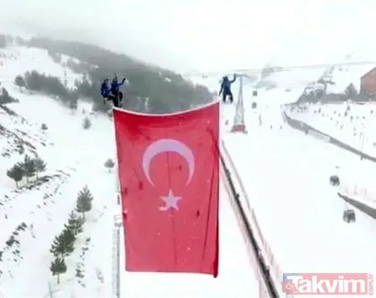 İdlib şehitleri için Palandöken’in zirvesine dev Türk bayrağı asıldı!
