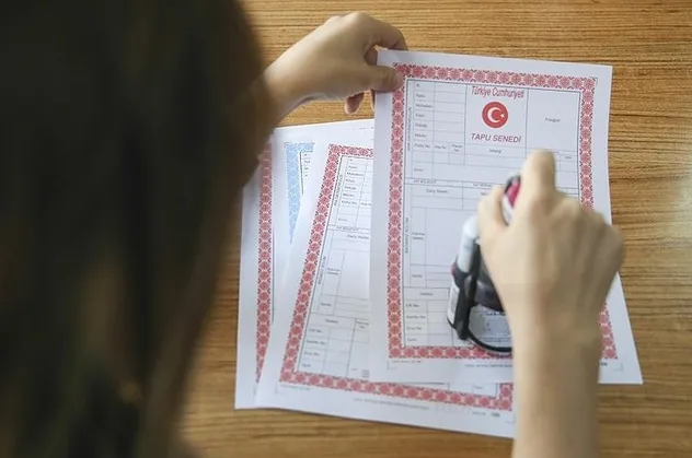 Tapu işlemlerinde 2021'de rekor artış! Devletin kasasına 24 milyar TL girdi