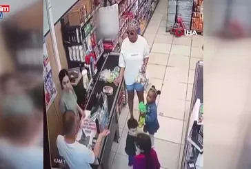 Esenyurt'ta markette dehşet! Kızının önünde kadına dayak kamerada!- İzle