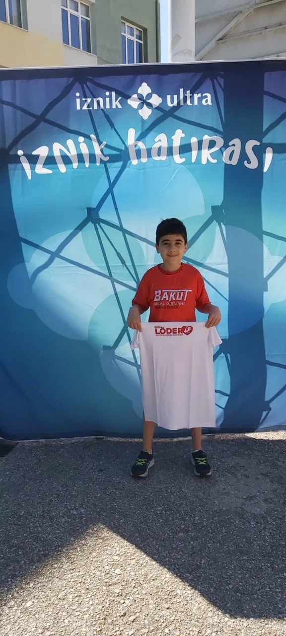 helal-sana-emir-kaan-bakutun-genc-sporcusu-losemili-cocuklar-icin-5-km-kostu-1653232596156.jpg Helal sana Emir Kaan! Bakut'un genç sporcusu lösemili çocuklar için 5 km koştu-3