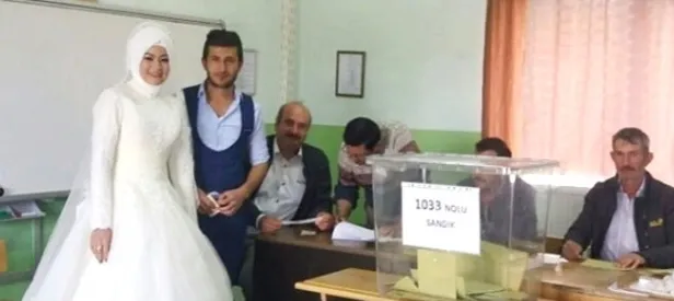 Düğün gününde oy kullanmaya gelinliğiyle geldi