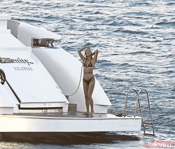 Ebru Şallı ve eşi Uğur Akkuş teknede aşka geldi birbirlerine öpücükler kondurdular! Tatil bahane romantizm şahane - 8