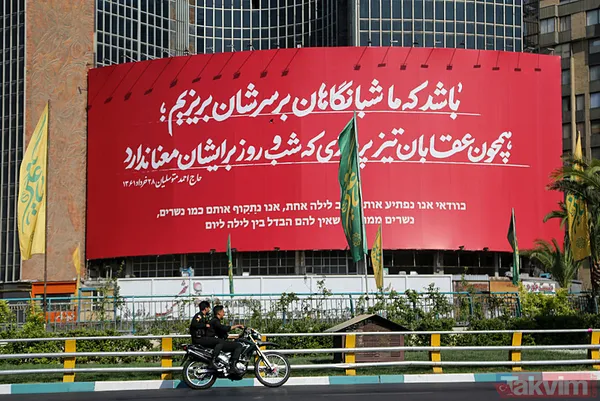 İran-İsrail arasın misilleme savaşı! Tahran sokaklarında “intikam” afişleri - 2
