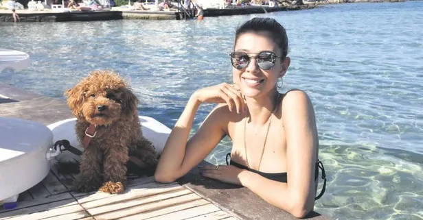 Ece Begüm Yücetan köpeğiyle poz verdi