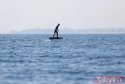 Dünya şampiyonu Kenan Sofuoğlu, karadaki hız tutkusunu flyboardla göle taşıdı