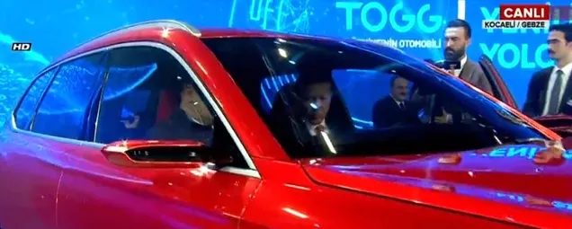 Yerli otomobil tanıtıldı! Başkan Erdoğan yerli ve milli otomobilin sürücü koltuğunda |Video