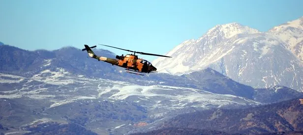 Helikopterler ateş altına aldı