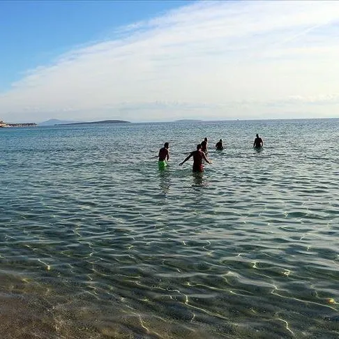 Lensle denize girmeyin