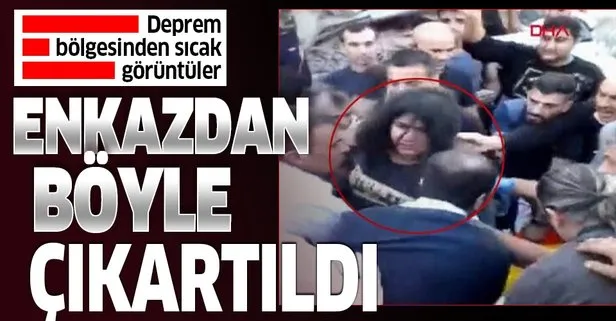 Son dakika: İzmir depreminde enkazdan bir kadının yaralı çıkarılma anları kamerada