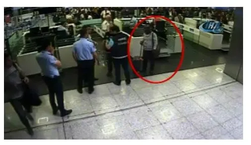 Düğmenin içinde uyuşturucu kaçıran kurye yakalandı-3