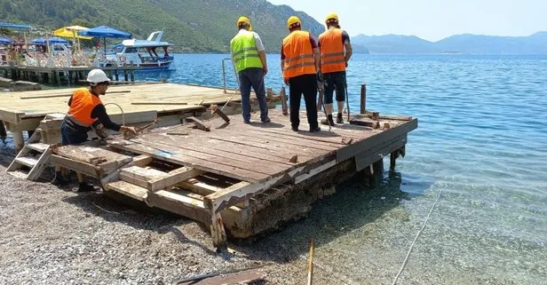 Muğla Marmaris’te kaçak iskeleler yıkılıyor