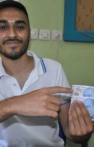 Bankamatikten çektiği hatalı basım 100 TL'lik banknota teklif bekliyor!