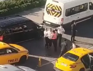 Ağlayan çocuğuna aldırmadan taksiciye silah çekti