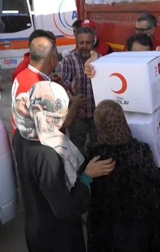 Kızılay'dan Telabyad'da 1500 Suriyeli aileye yardım