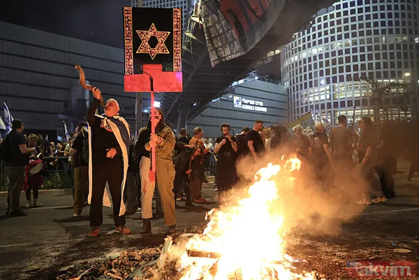 İsrail sokakları karıştı | Tel Aviv sokaklara döküldü! Katil Netanyahu'ya tepki yağdı: İstifa et - 44