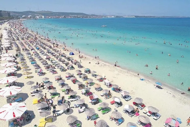 Deniz suyu ve güneş Kovid-19'un etkisini azaltıyor!-1