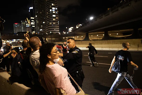 Tel Aviv'de kafesli protesto! Onlarca İsrailli, Netanyahu'nun istifası için sokaklara döküldü: Sen baştasın, sen suçlusun - 8