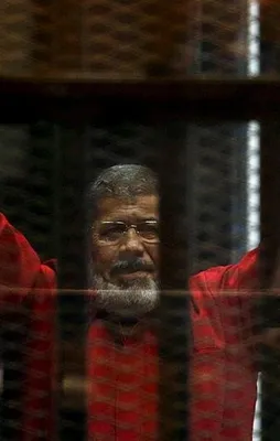 Mursi: "Duruşma salonundayım ancak..."