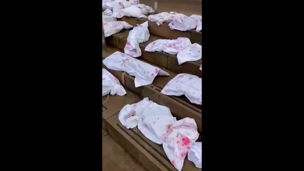 Katil İsrail'in savunuculuğunu yapan İngiliz BBC'ye Gazze tepkisi: Merkezin önünde bebek ceset torbası koydular-5