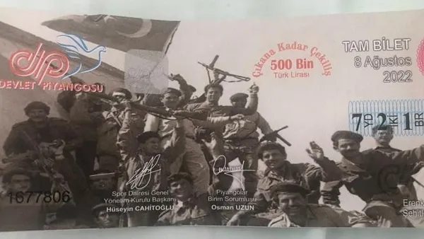 kktcde-piyango-skandali-biletin-uzerine-basilan-fotograf-buyuk-tepki-cekti-1658737841189.jpg KKTC'de piyango skandalı! Biletin üzerine basılan fotoğraf büyük tepki çekti-2