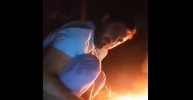 Adana'da ormanlık alanda bir tavuğun boğazını kesip cinler alemine adamak için ateşe atan Y.Y.'nin görüntüleri tepki çekti