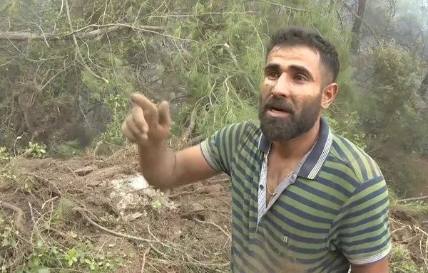 suriyeli-hasan-izmirdeki-yangini-sondurmek-icin-elleriyle-toprak-tasidi-1596318953714.jpeg Suriyeli Hasan İzmir'deki yangını söndürmek için elleriyle toprak taşıdı!-3