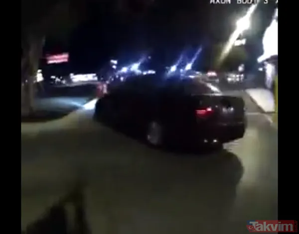 ABD'de polis sürücü koltuğundan inmeyen genci silahla vurarak yaraladı - 9