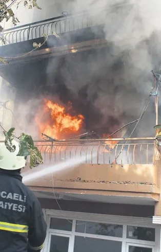 Yangında 3 kedisi ölen kadın sinir krizi geçirdi