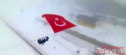 İdlib şehitleri için Palandöken’in zirvesine dev Türk bayrağı asıldı!