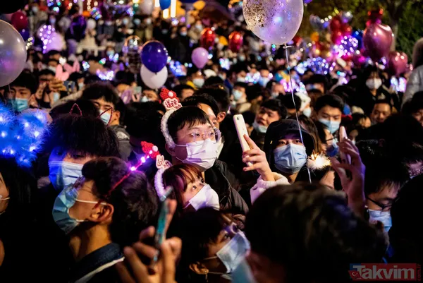 Koronavirüsün ortaya çıktığı Vuhan'da yılbaşı kutlaması! Görüntüler pes dedirtti - 5