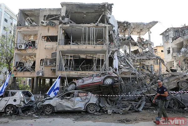 İran'dan İsrail'e misilleme! Füzeler yağdı binalar yıkıldı | İşte yıkımdan kareler - 20