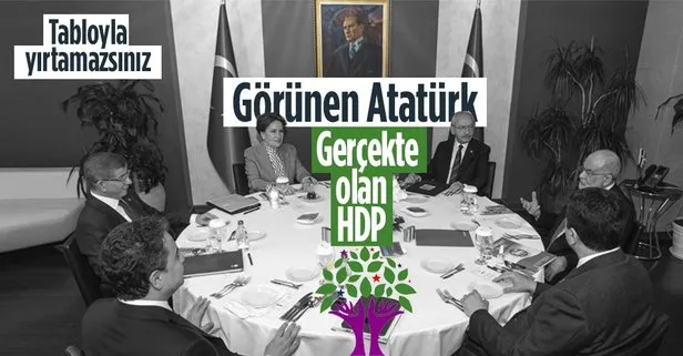 Atatürk tablosuyla poz vererek göz boyama çabası