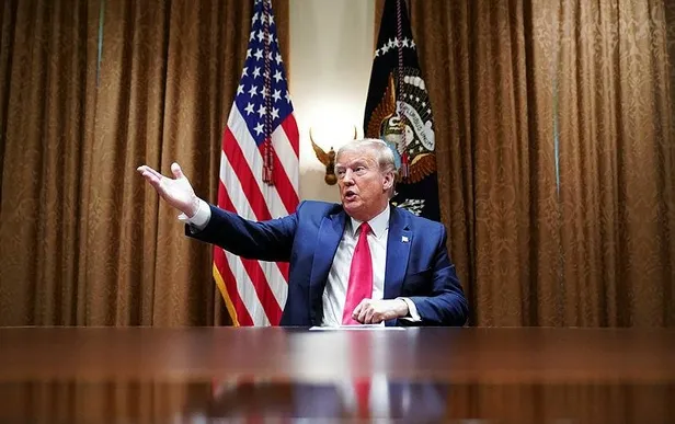 ABD Başkanı Trump ve eyalet valileri arasındaki "ekonomiyi faaliyete geçirme yetkisi kimde" tartışması büyüyor-1