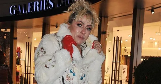 Yeliz Yeşilmen'in yüzündeki fondöten beyaz kürküne bulaştı