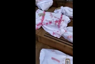 Katil İsrail'in savunuculuğunu yapan İngiliz BBC'ye Gazze tepkisi: Merkezin önünde bebek ceset torbası koydular