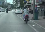 Bursa'da yürekleri ağza getiren görüntü! Motosiklet üzerinde tehlikeli yolculuk