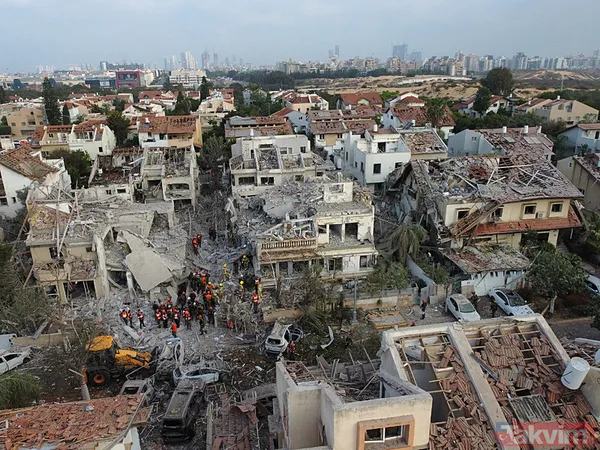 İran'dan İsrail'e misilleme! Füzeler yağdı binalar yıkıldı | İşte yıkımdan kareler - 6