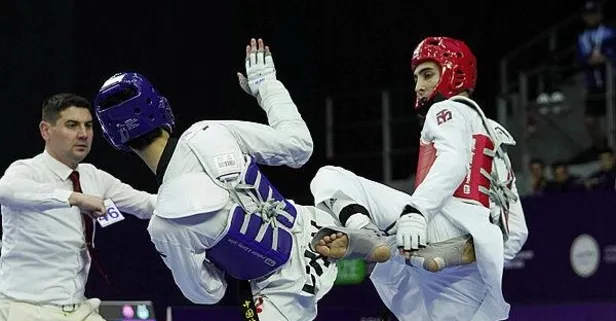 Milli sporcu Hakan Reçber ve Nafia Kuş Dünya Tekvando Şampiyonası'nda altın madalyanın sahibi oldu