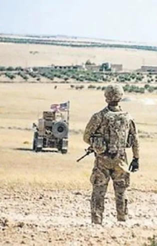 ABD askerleri Suriye'deki ilk depoyu boşalttı