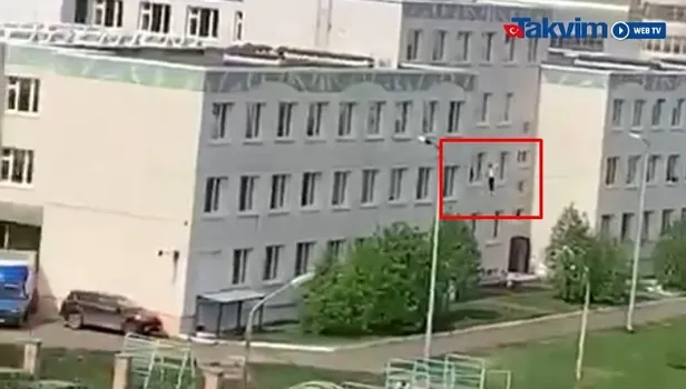 Tataristan'da okula saldırı! Öğrencilerin can havliyle camdan atladığı anlar ve saldırganın yakalandığı an videosu izle