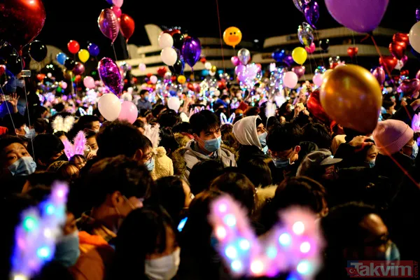 Koronavirüsün ortaya çıktığı Vuhan'da yılbaşı kutlaması! Görüntüler pes dedirtti - 9