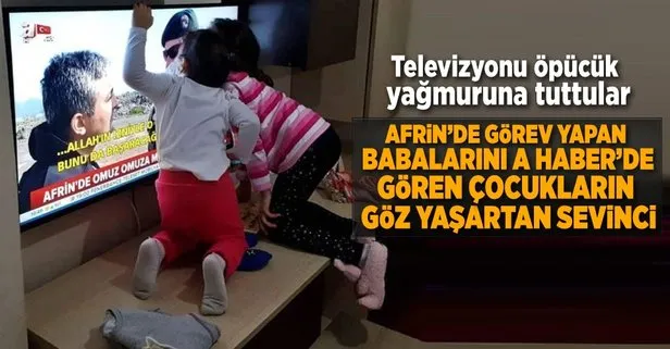 Babalarını televizyonda gören polis çocuklarının sevinci