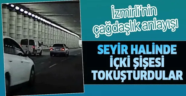 İzmir’de skandal görüntü! Trafikte içki şişesi tokuşturma anları kamerada