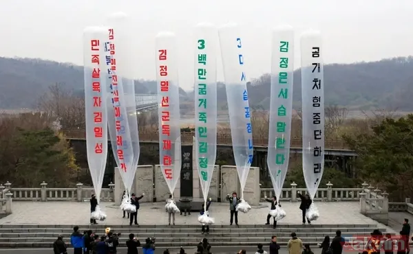 Dünya gündemine oturan olay! İki düşman birbirine girdi! Balonla dışkı ve çöp gönderdiler - 6