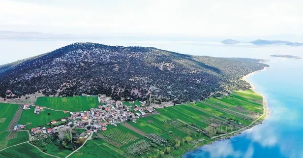 Gölün ortasındaki adada koronavirüsten izole bir hayat sürdürüyorlar