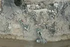 Hatay'da enkazlardan toplanan molozlar kamyonlarla belirlenen alanlara taşınıyor